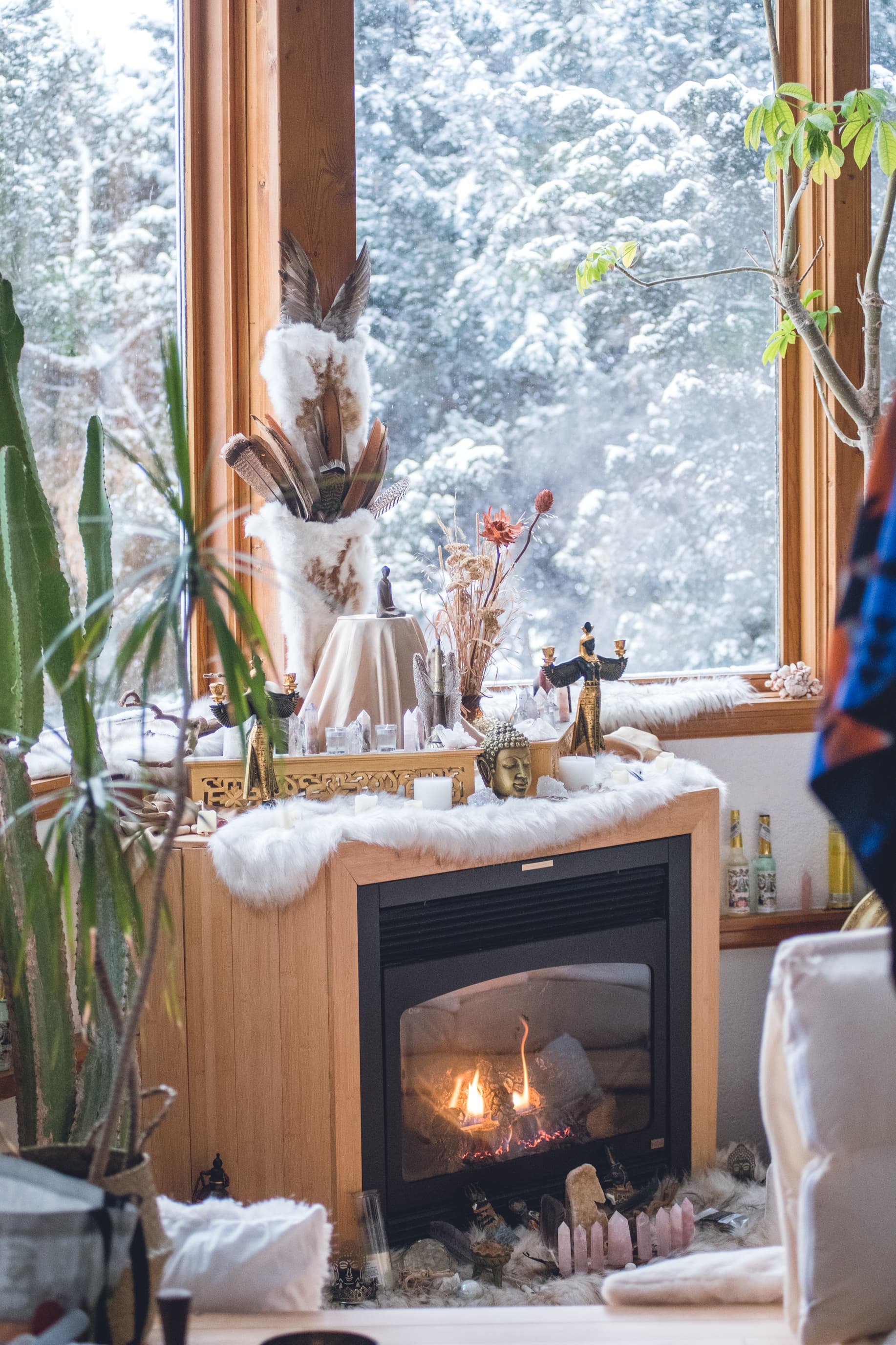 The main gathering room at the Colorado retreat property, fireplace lit